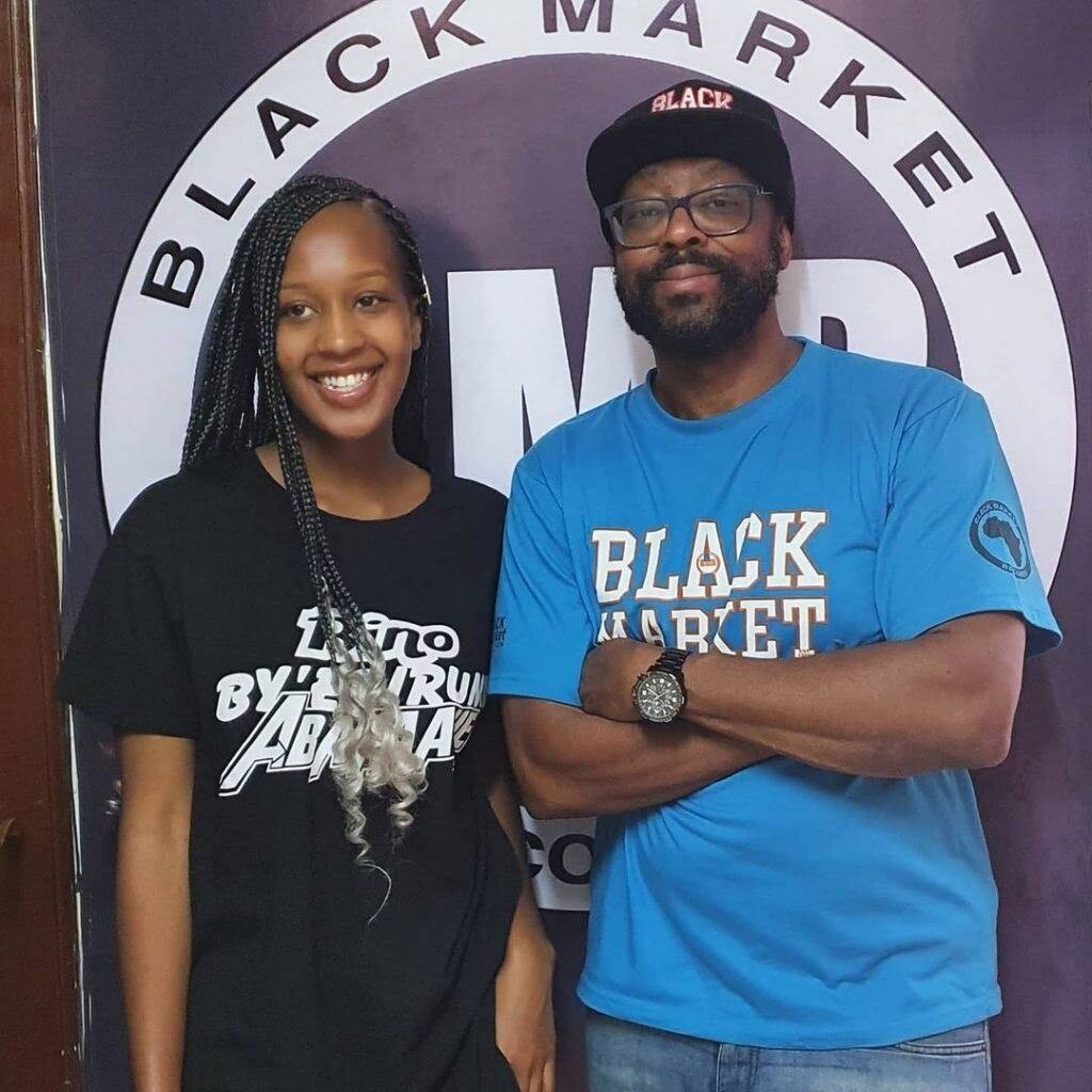 DJ Alisha with a Black Market representative 