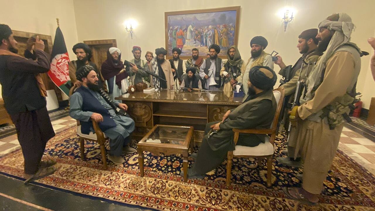 Taliban's leader (center) together with his fellow militants