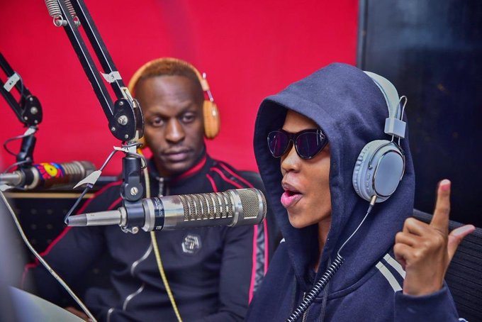 God's Plan Stares at Sheila during an interview at Sanyu FM earlier this month 