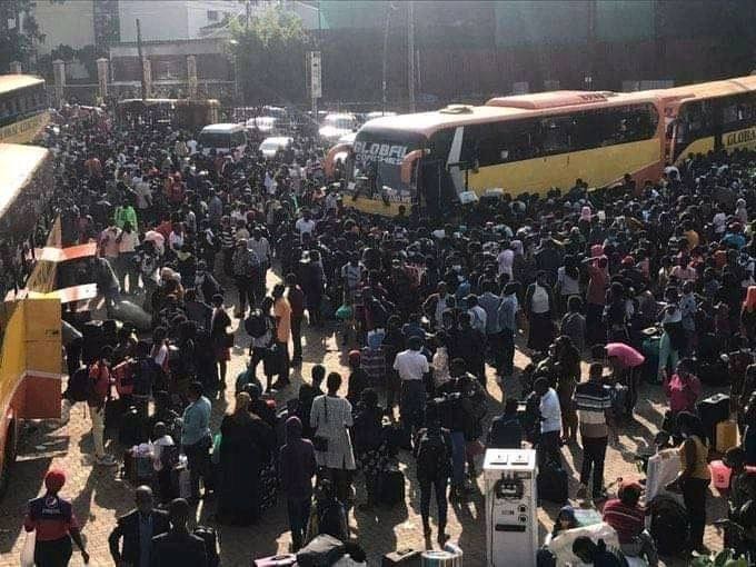 Stranded Ugandans at the Global Bus Terminal near Bakuli 