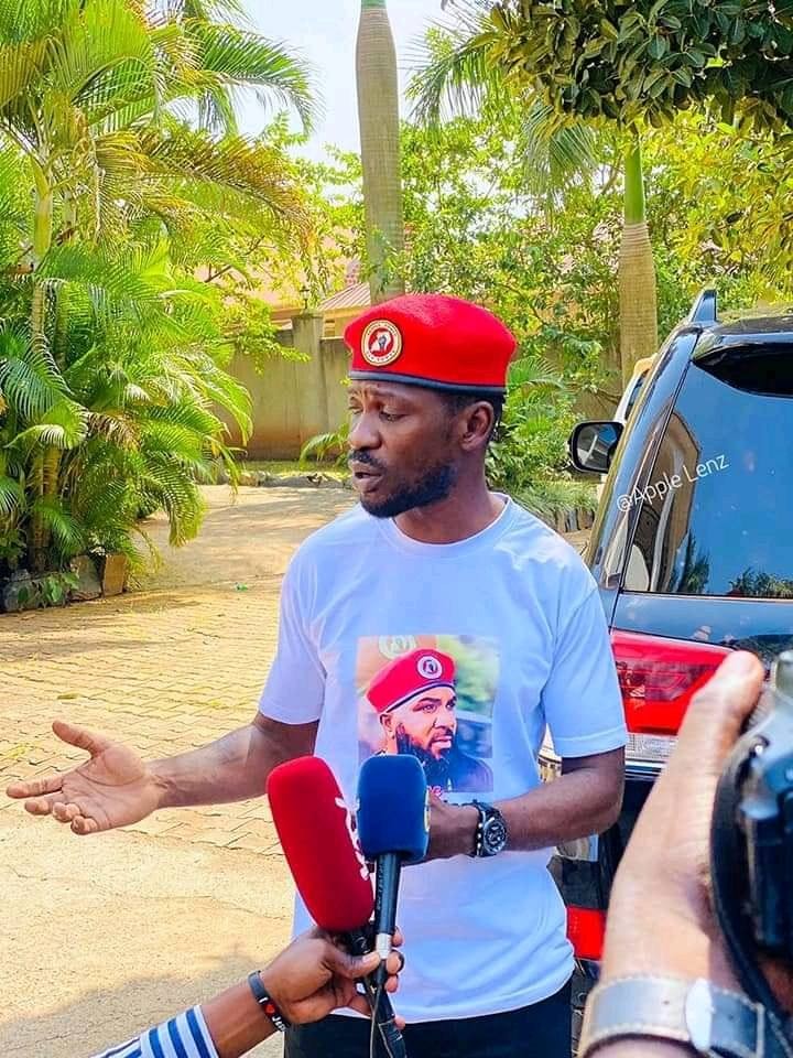 Bobi Wine addresses media yesterday shortly after receiving his car