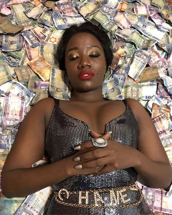 Lydia Jazmine sleeps on a Masuuka (Bed Sheet) of money 