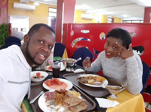 Faridah and her man having a meal