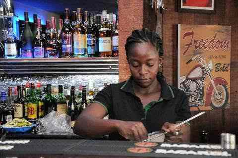 Bartenders in Uganda hold press conference.