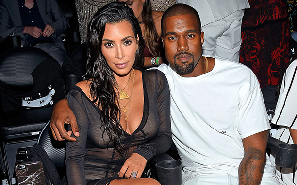 Mixed Reactions as Kanye West and his Wife Kim Kardashian Arrive in Uganda..